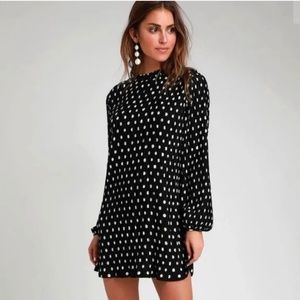 Lulu’s pleat to meet you black and white polkadot dress